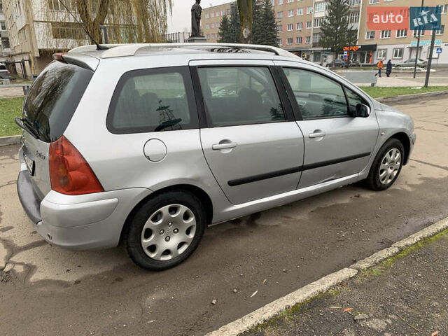 Сірий Пежо 307, об'ємом двигуна 1.59 л та пробігом 300 тис. км за 2000 $, фото 11 на Automoto.ua