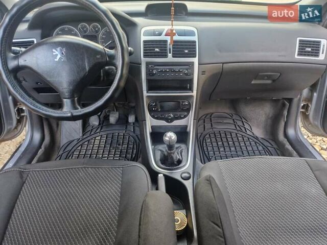 Сірий Пежо 307, об'ємом двигуна 2 л та пробігом 506 тис. км за 3900 $, фото 19 на Automoto.ua