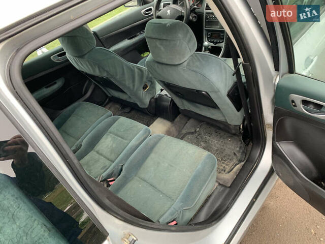 Сірий Пежо 307, об'ємом двигуна 1.59 л та пробігом 300 тис. км за 2000 $, фото 25 на Automoto.ua