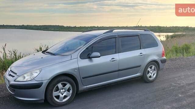 Серый Пежо 307, объемом двигателя 1.59 л и пробегом 192 тыс. км за 4500 $, фото 2 на Automoto.ua