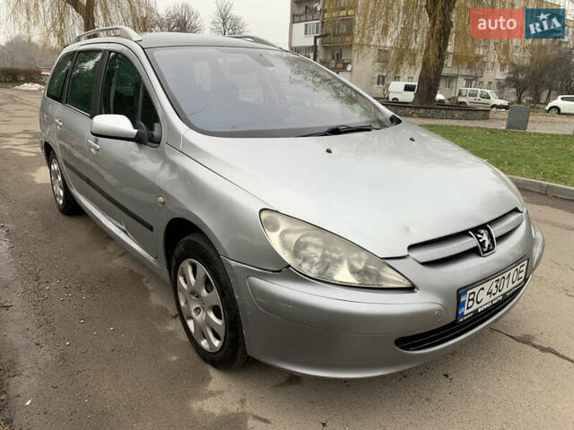 Сірий Пежо 307, об'ємом двигуна 1.59 л та пробігом 300 тис. км за 2000 $, фото 1 на Automoto.ua