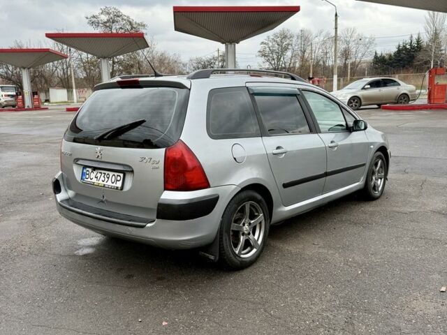 Серый Пежо 307, объемом двигателя 2 л и пробегом 400 тыс. км за 3500 $, фото 3 на Automoto.ua