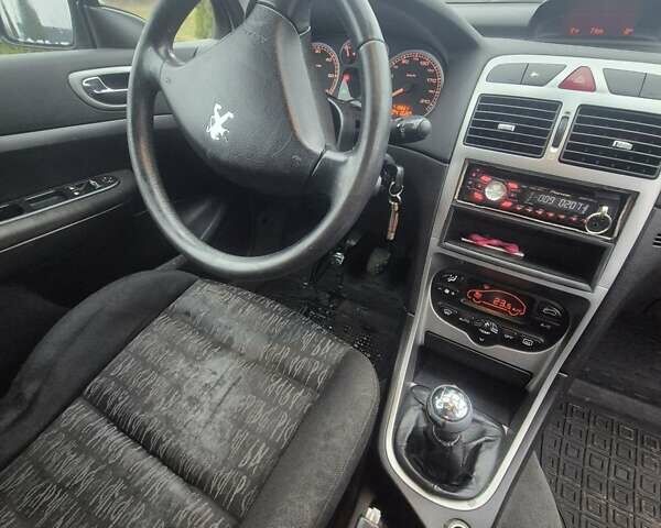 Серый Пежо 307, объемом двигателя 2 л и пробегом 241 тыс. км за 2476 $, фото 2 на Automoto.ua