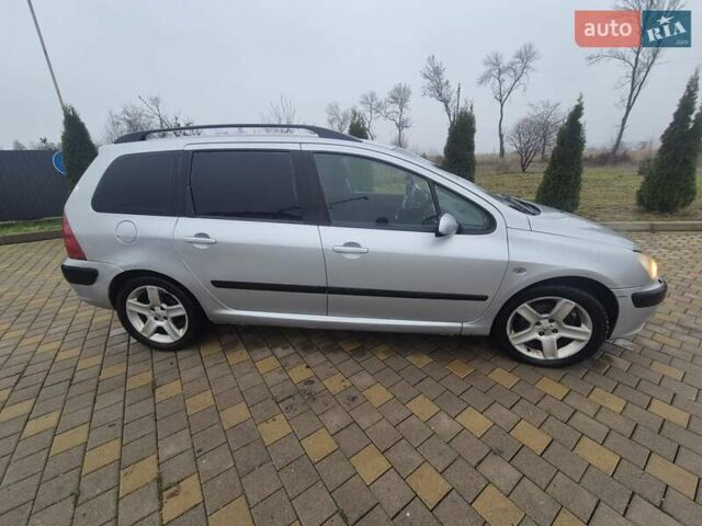 Серый Пежо 307, объемом двигателя 2 л и пробегом 241 тыс. км за 2476 $, фото 1 на Automoto.ua