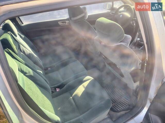 Серый Пежо 307, объемом двигателя 2 л и пробегом 320 тыс. км за 3000 $, фото 3 на Automoto.ua