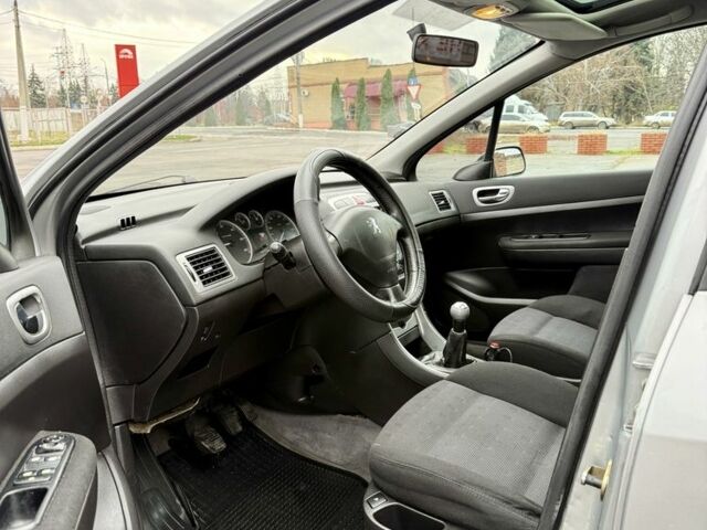 Серый Пежо 307, объемом двигателя 2 л и пробегом 400 тыс. км за 3500 $, фото 7 на Automoto.ua