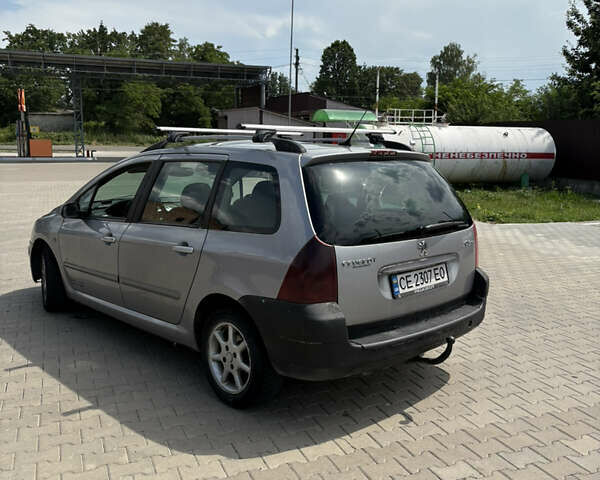 Сірий Пежо 307, об'ємом двигуна 2 л та пробігом 395 тис. км за 2700 $, фото 4 на Automoto.ua