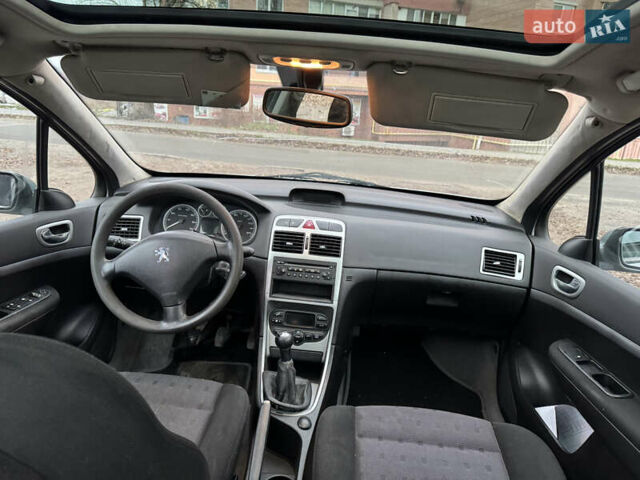 Серый Пежо 307, объемом двигателя 2 л и пробегом 315 тыс. км за 3300 $, фото 6 на Automoto.ua