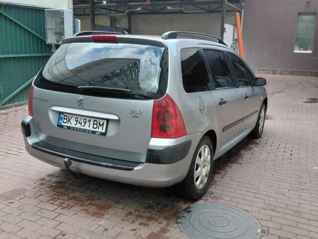 Серый Пежо 307, объемом двигателя 1.4 л и пробегом 400 тыс. км за 3500 $, фото 6 на Automoto.ua