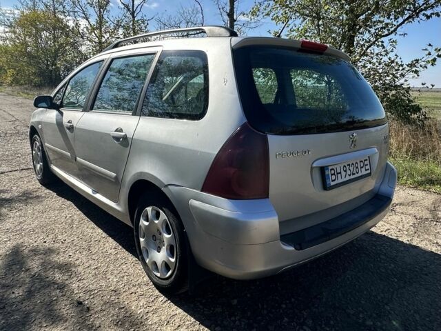 Серый Пежо 307, объемом двигателя 1.4 л и пробегом 240 тыс. км за 3500 $, фото 2 на Automoto.ua