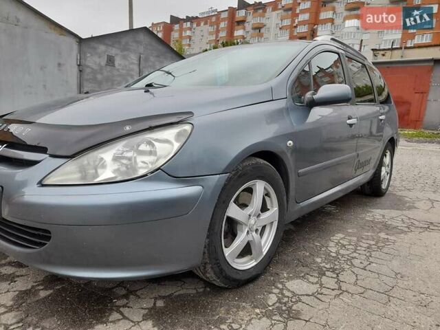Серый Пежо 307, объемом двигателя 2 л и пробегом 315 тыс. км за 4000 $, фото 9 на Automoto.ua