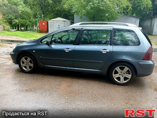 Серый Пежо 307, объемом двигателя 1.6 л и пробегом 460 тыс. км за 3000 $, фото 1 на Automoto.ua