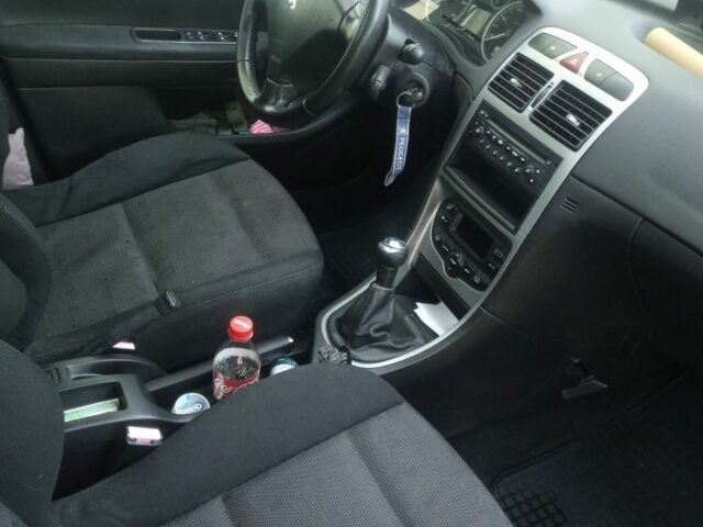 Серый Пежо 307, объемом двигателя 1.6 л и пробегом 225 тыс. км за 4200 $, фото 3 на Automoto.ua