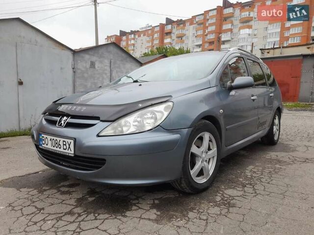 Серый Пежо 307, объемом двигателя 2 л и пробегом 315 тыс. км за 4000 $, фото 7 на Automoto.ua