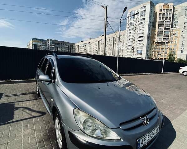 Серый Пежо 307, объемом двигателя 1.36 л и пробегом 235 тыс. км за 4000 $, фото 4 на Automoto.ua