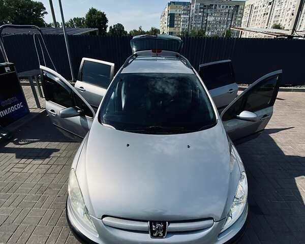 Сірий Пежо 307, об'ємом двигуна 1.36 л та пробігом 235 тис. км за 3800 $, фото 30 на Automoto.ua