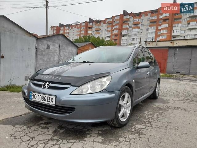 Серый Пежо 307, объемом двигателя 2 л и пробегом 315 тыс. км за 4000 $, фото 11 на Automoto.ua