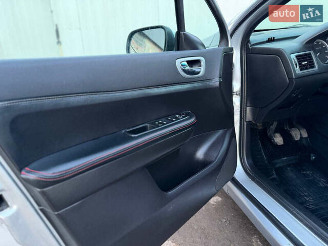 Серый Пежо 307, объемом двигателя 2 л и пробегом 208 тыс. км за 3250 $, фото 31 на Automoto.ua