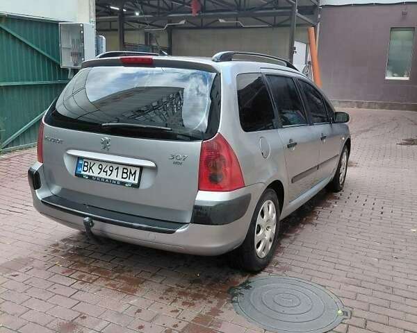 Серый Пежо 307, объемом двигателя 1.4 л и пробегом 400 тыс. км за 3500 $, фото 5 на Automoto.ua