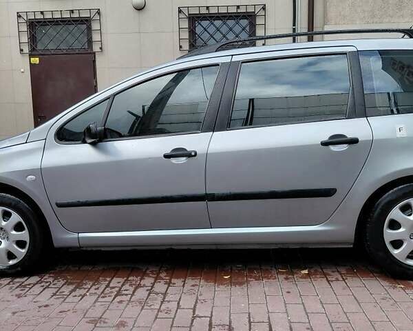 Серый Пежо 307, объемом двигателя 1.4 л и пробегом 400 тыс. км за 3500 $, фото 3 на Automoto.ua