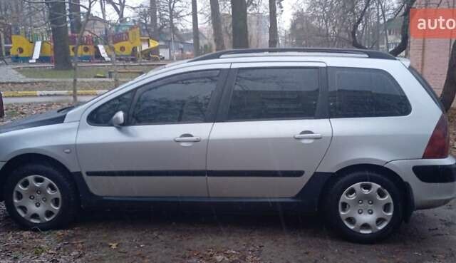 Серый Пежо 307, объемом двигателя 1.4 л и пробегом 333 тыс. км за 3100 $, фото 3 на Automoto.ua