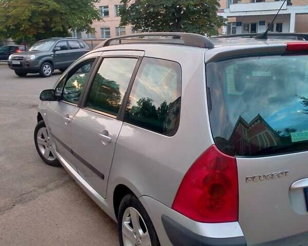 Серый Пежо 307, объемом двигателя 2 л и пробегом 267 тыс. км за 4599 $, фото 4 на Automoto.ua