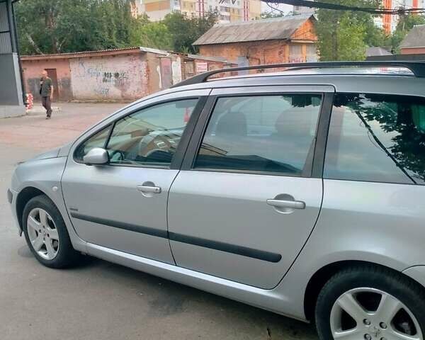 Серый Пежо 307, объемом двигателя 2 л и пробегом 267 тыс. км за 4599 $, фото 9 на Automoto.ua