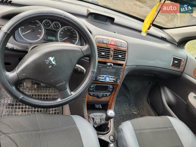 Серый Пежо 307, объемом двигателя 2 л и пробегом 261 тыс. км за 4500 $, фото 4 на Automoto.ua