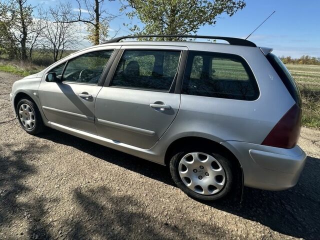 Серый Пежо 307, объемом двигателя 1.4 л и пробегом 240 тыс. км за 3500 $, фото 4 на Automoto.ua