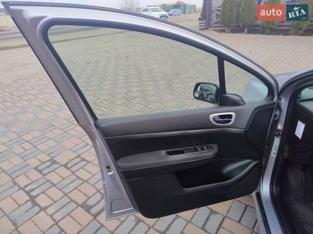 Сірий Пежо 307, об'ємом двигуна 1.6 л та пробігом 345 тис. км за 3800 $, фото 12 на Automoto.ua