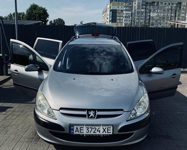 Серый Пежо 307, объемом двигателя 1.36 л и пробегом 235 тыс. км за 4000 $, фото 28 на Automoto.ua