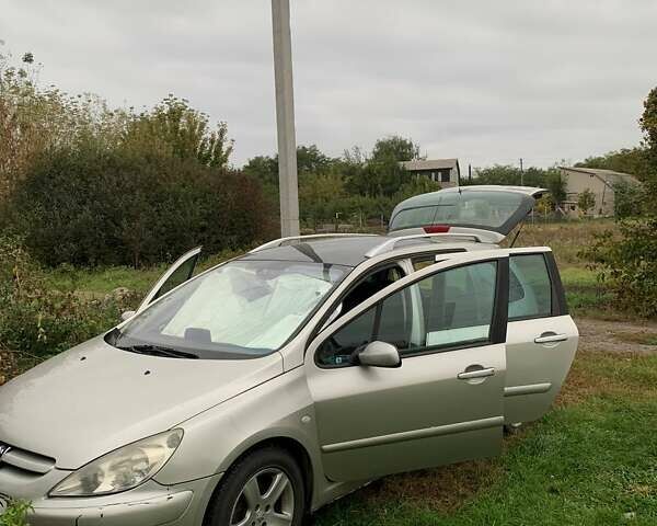 Сірий Пежо 307, об'ємом двигуна 1.6 л та пробігом 296 тис. км за 2600 $, фото 3 на Automoto.ua