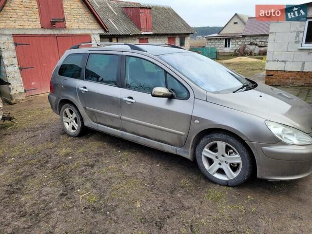 Серый Пежо 307, объемом двигателя 2 л и пробегом 261 тыс. км за 4500 $, фото 9 на Automoto.ua