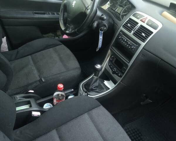 Серый Пежо 307, объемом двигателя 1.56 л и пробегом 265 тыс. км за 4200 $, фото 9 на Automoto.ua