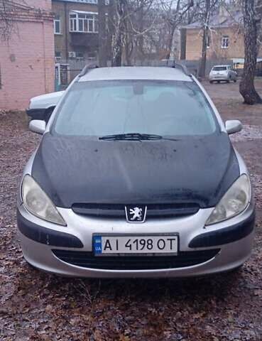 Серый Пежо 307, объемом двигателя 1.4 л и пробегом 333 тыс. км за 3100 $, фото 4 на Automoto.ua
