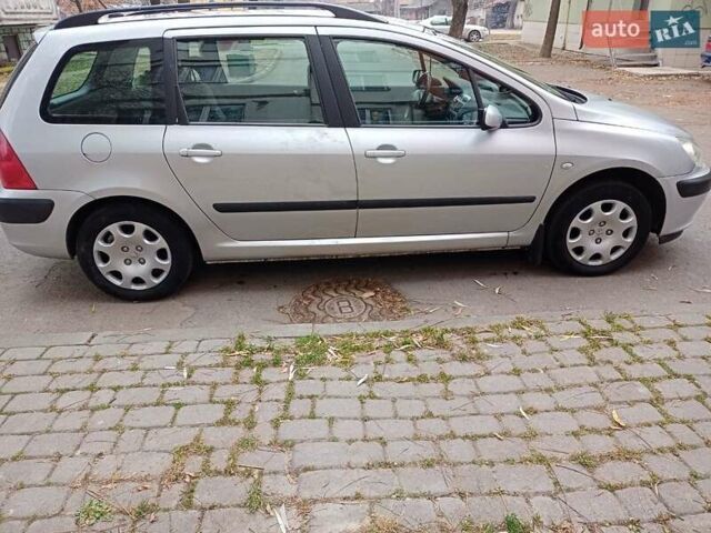 Серый Пежо 307, объемом двигателя 1.4 л и пробегом 171 тыс. км за 3400 $, фото 9 на Automoto.ua