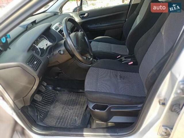 Серый Пежо 307, объемом двигателя 1.4 л и пробегом 171 тыс. км за 3400 $, фото 23 на Automoto.ua