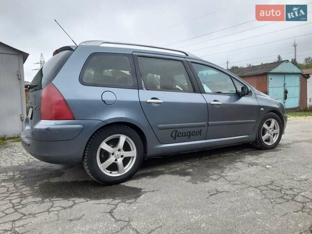 Серый Пежо 307, объемом двигателя 2 л и пробегом 315 тыс. км за 4000 $, фото 13 на Automoto.ua