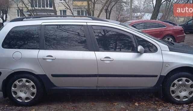 Серый Пежо 307, объемом двигателя 1.4 л и пробегом 333 тыс. км за 3100 $, фото 7 на Automoto.ua