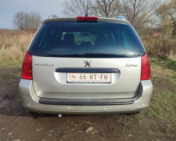 Серый Пежо 307, объемом двигателя 1.6 л и пробегом 223 тыс. км за 4950 $, фото 4 на Automoto.ua