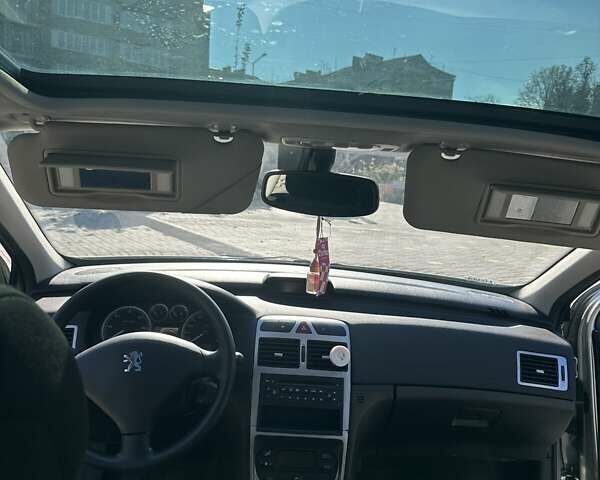 Серый Пежо 307, объемом двигателя 1.6 л и пробегом 161 тыс. км за 4999 $, фото 12 на Automoto.ua