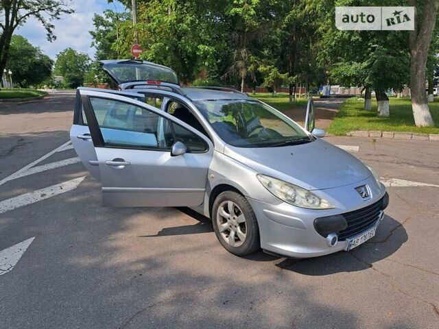 Серый Пежо 307, объемом двигателя 2 л и пробегом 320 тыс. км за 4400 $, фото 12 на Automoto.ua