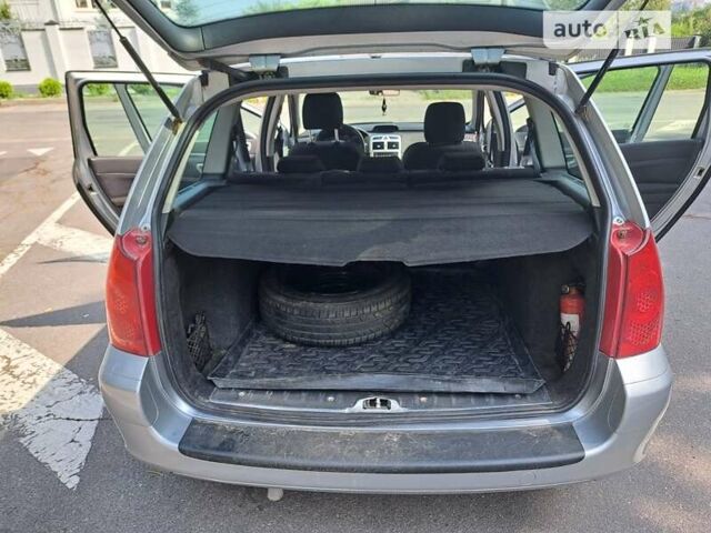 Серый Пежо 307, объемом двигателя 2 л и пробегом 320 тыс. км за 4400 $, фото 15 на Automoto.ua