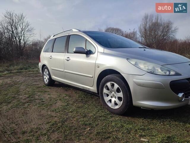 Серый Пежо 307, объемом двигателя 1.6 л и пробегом 223 тыс. км за 4950 $, фото 7 на Automoto.ua