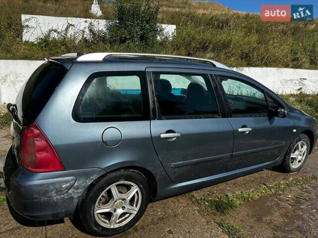 Серый Пежо 307, объемом двигателя 2 л и пробегом 325 тыс. км за 3500 $, фото 5 на Automoto.ua