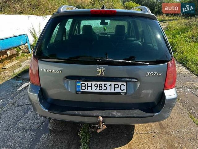 Серый Пежо 307, объемом двигателя 2 л и пробегом 325 тыс. км за 3500 $, фото 1 на Automoto.ua