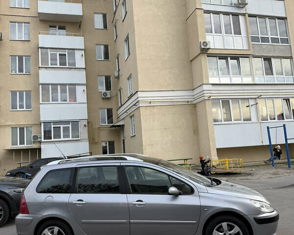 Серый Пежо 307, объемом двигателя 1.59 л и пробегом 227 тыс. км за 3650 $, фото 4 на Automoto.ua