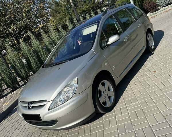 Серый Пежо 307, объемом двигателя 1.6 л и пробегом 161 тыс. км за 4999 $, фото 1 на Automoto.ua