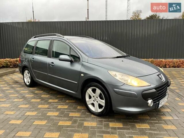 Серый Пежо 307, объемом двигателя 1.36 л и пробегом 320 тыс. км за 4100 $, фото 12 на Automoto.ua