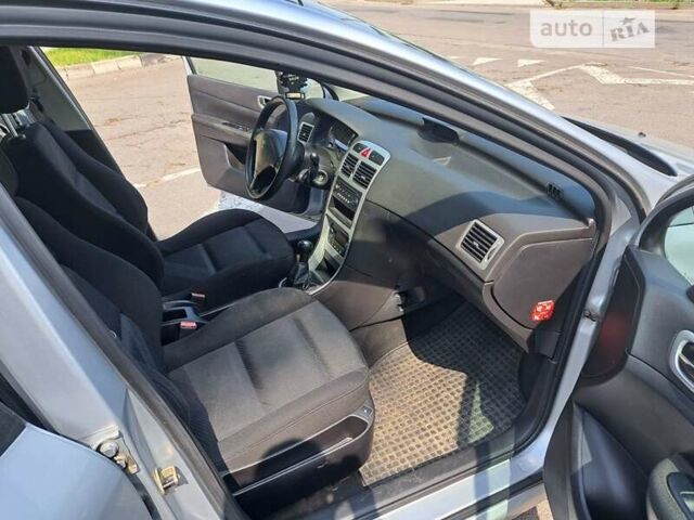 Серый Пежо 307, объемом двигателя 2 л и пробегом 320 тыс. км за 4400 $, фото 13 на Automoto.ua